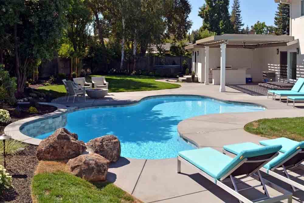 backyard renovation with swimming pool showing cost and design
